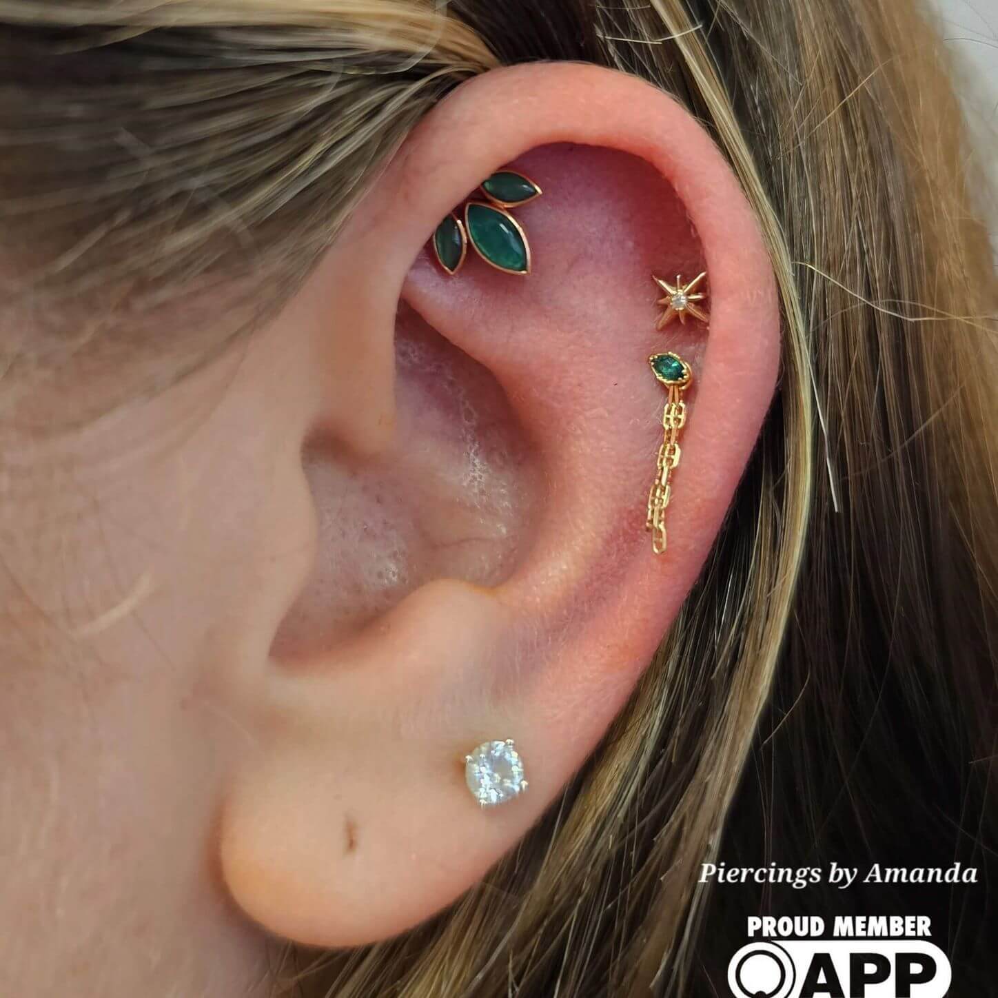Ear curation with 14 and 18k yellow gold