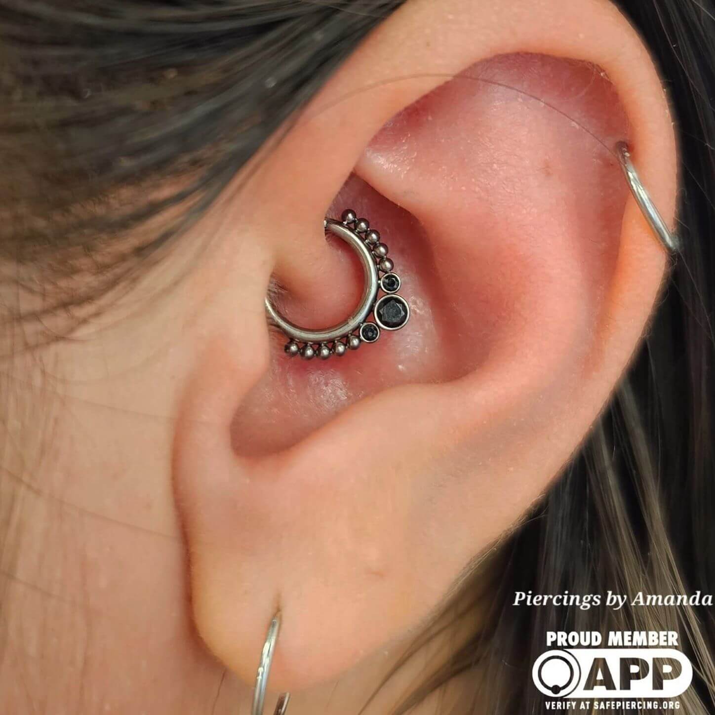 Daith piercing with niobium