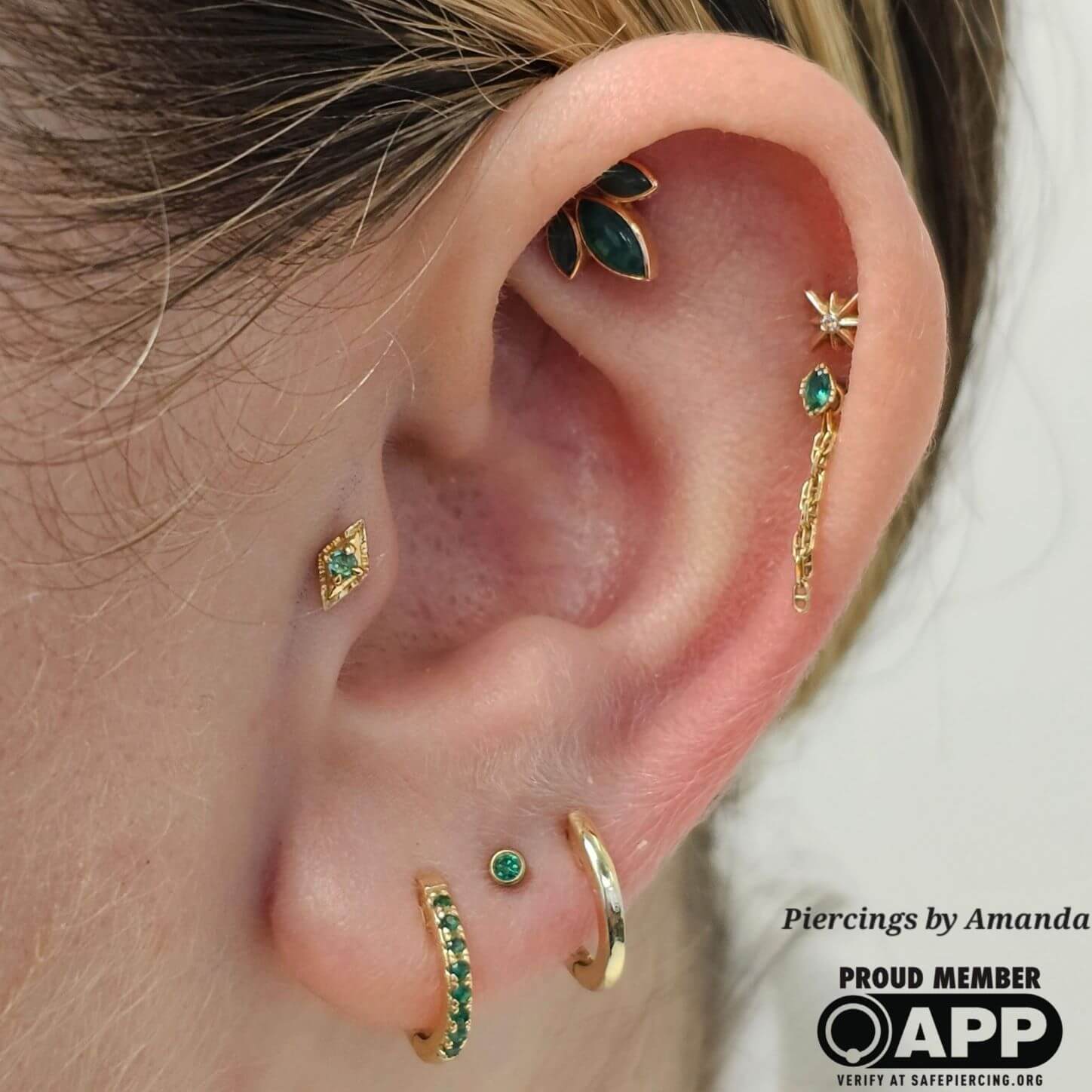 Ear curation with 14k and 18k yellow gold pieces